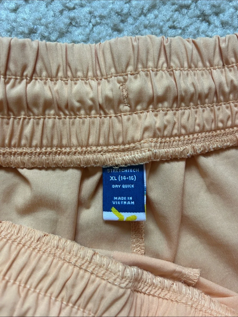 Pair of old navy active quick dry shorts-light orange and bright tropical pink